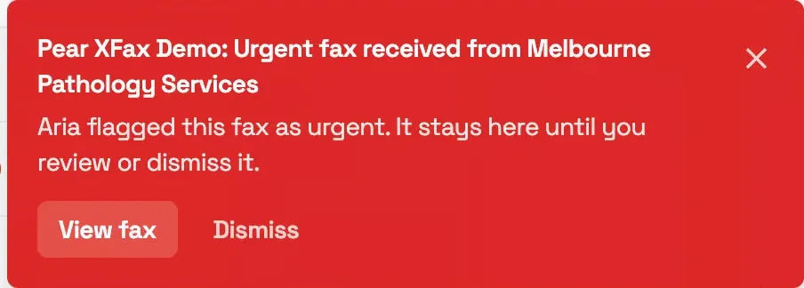 The red urgent-fax alert that appears on every screen until actioned